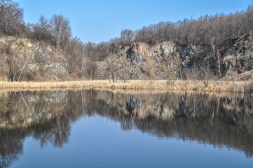 old abandoned stone quarry basalt mine flooded with water
