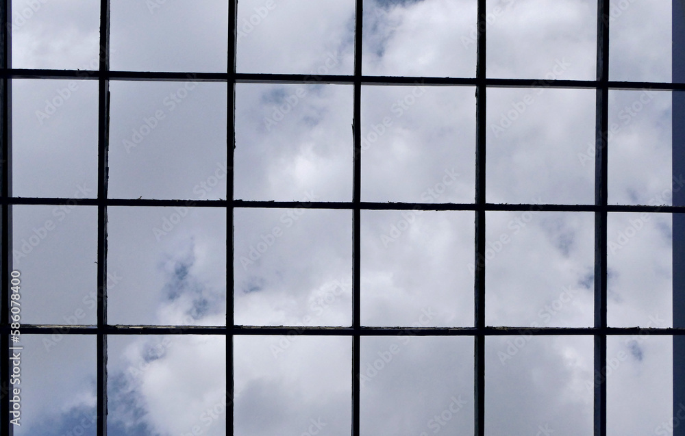Poster square frame of a window on a sky background
