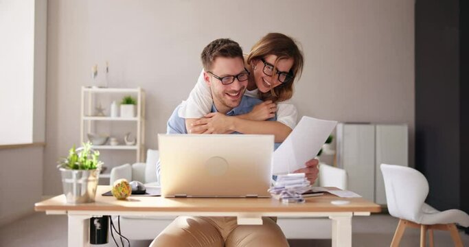 Couple Doing Taxes And Family Budget