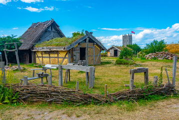 Wooden huts at Foteviken viking museum in Sweden - obrazy, fototapety, plakaty