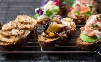 Variety of mini sandwiches with cream cheese