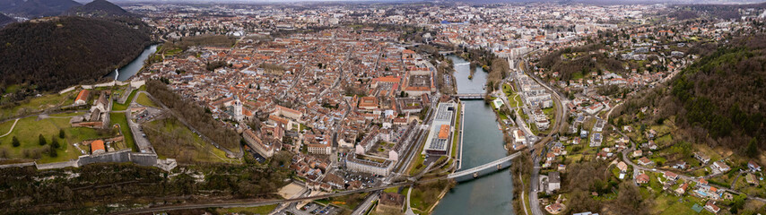 Aerial of the city besancon in France on cloudy afternoon in late winter.