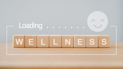 For wellness, wellbeing, relaxation mental health concept. wellness word on wooden cube block with...
