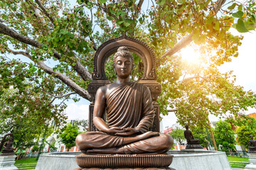 Buddha statues at the Bodhi tree courtyard, Wat Benchamabophit Dusitwanaram or The Marble Temple at Bangkok, Thailand Buddhist temple and now a major tourist attraction