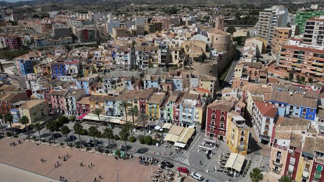 Drone footage coastline and La Vila Joiosa touristic town view from top, sandy beach and Mediterranean seascape.Costa Blanca, Spain.