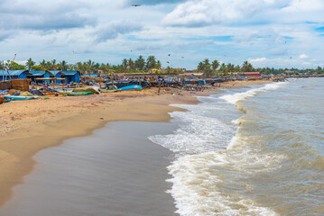Fishing boats mooring at the shore of Negombo lagoon in Sri Lanka