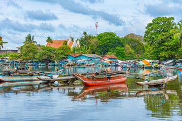 traditional catamarans mooring at the shore of Negombo lagoon in Sri Lanka