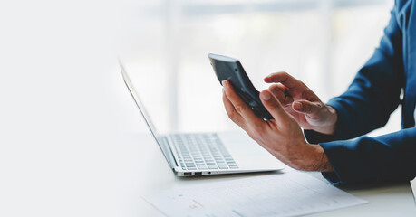 Close-up of business people working on taxes, financial accounting calculations, brokerage, copy space