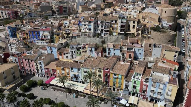 Aerial drone view of La Vila Joiosa.Flying over colorful houses on the Mediterranean coast in the city of La Vila Joiosa in Spain.Costa Blanca.