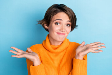 Photo portrait of lovely young lady sorry forget shrug shoulders cute wear trendy orange clothes...