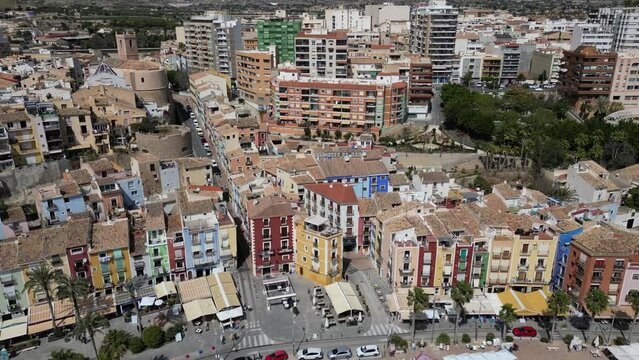 Aerial drone view of La Vila Joiosa.Flying over colorful houses on the Mediterranean coast in the city of La Vila Joiosa in Spain.Costa Blanca.