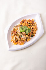 wok fried big fresh oyster with crispy egg omelette on wood table asian chinese halal banquet seafood menu