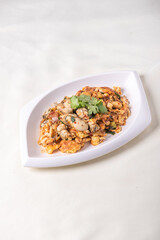 wok fried big fresh oyster with crispy egg omelette on wood table asian chinese halal banquet seafood menu