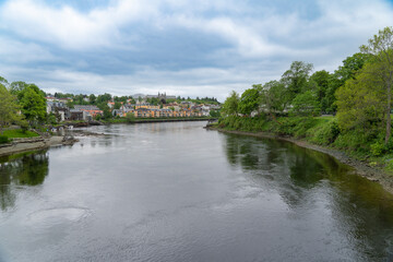 Fototapeta na wymiar View from the famous wooden bridge on the Nideva river in Trondheim, Norway