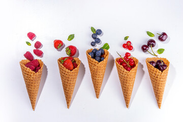 Waffle cones with fresh summer berries