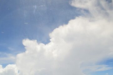 Bright blue sky background during the day with clouds