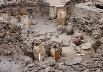 Recovered ancient pottery in prehistoric town of Akrotiri, excavation site of a Minoan Bronze Age...