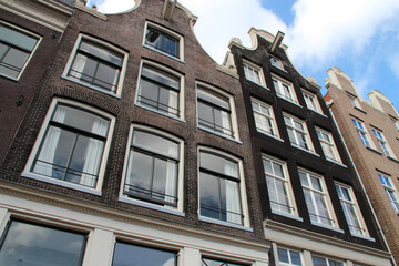 old houses at geldersekade in amsterdam in netherlands