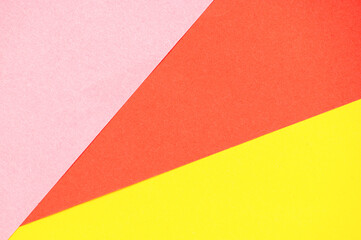 Red, pink and yellow paper background