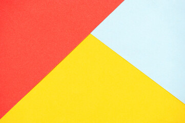 Abstract background with yellow, red and blue triangle. copy space