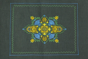 Embroidery element, pattern in oriental style, on linen fabric. Oriental pattern, for interior decoration, stylish design.