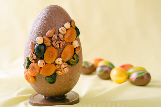 large chocolate egg with dried apricots and nuts