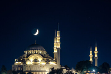 Fototapeta na wymiar Suleymaniye Mosque and crescent moon. Laylat al-qadr or kadir gecesi