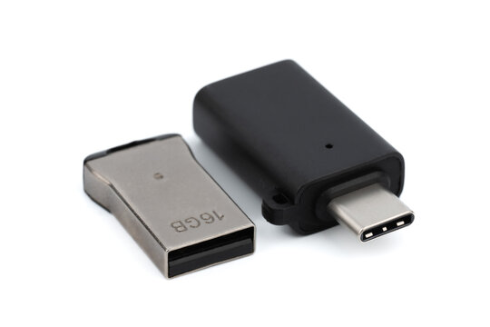A close up of USB OTG. Type C to Type A adapters with isolated on a white background. technology product photo concept.	
