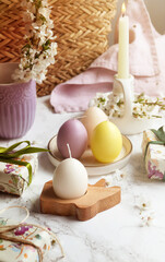 Obraz na płótnie Canvas Easter bunny and eggs candle decoration
