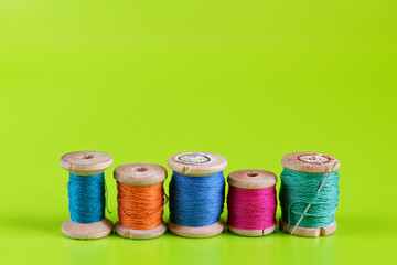 Old wooden reels of thread