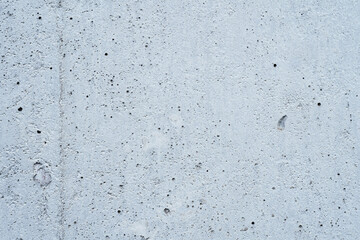Texture of old gray concrete wall for background. Wall fragment with scratches and cracks