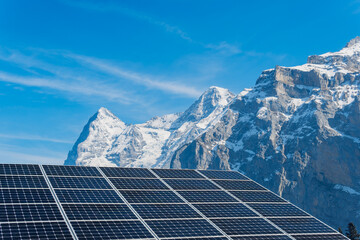 Solar panels on roof against mountains in daylight. Contemporary photovoltaic cells installed on...