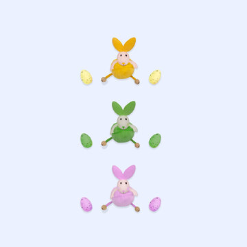 Minimal Easter concept. Happy Easter Bunny Toys with eggs in pastel colors. Blue background. 