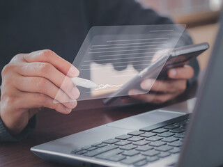Electronic signature concept. Businessman signs electronic documents on virtual laptop screen using...