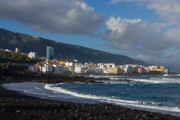 Tenerife town Puerto de la Cruz with black beach and sea