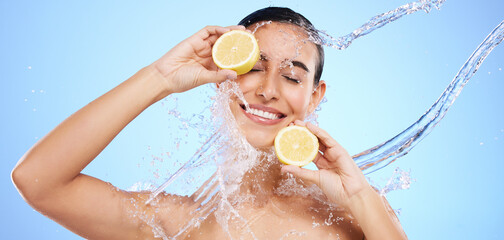 Beauty, lemon and water splash with woman in studio for natural cosmetics, nutrition and detox....