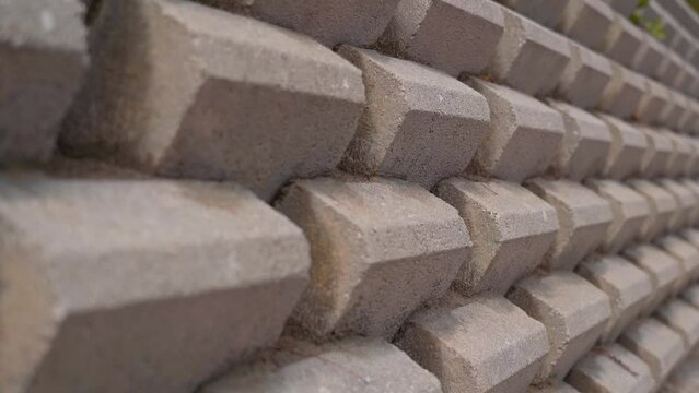 A wall made with concrete cone bricks