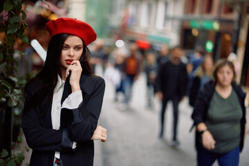 Woman walking down an old city street in a crowd, sociophobia, fear of crowds, fear of people, panic attack.