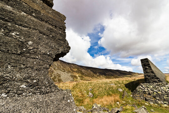 Crumbled remains of a section of the former dam associated with the Dolgarrog disaster which sits at the bottom of the Carneddau mountain range, Snowdonia, North Wales