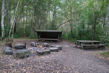 Shelter with table and fire pit in Denmark