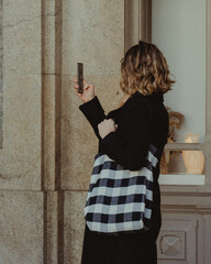 Tourist taking photo with smartphone