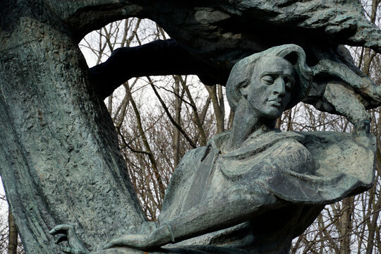 Warsaw, Poland - 26th March 2023 - The Fryderyk Chopin Monument in Lazienki Krolewskie - Royal Baths Park sculpted by Waclaw Szymanowski and Oskar Sosnowski in 1926