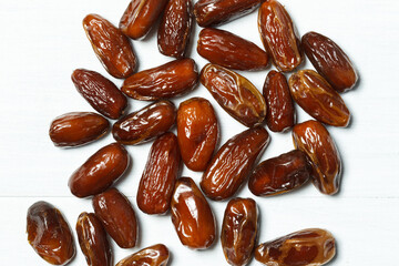 Background with Algerian dates in close-up. Wallpaper with dried fruits. top view. Lent