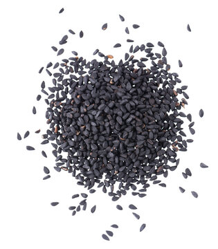 Black cumin seeds isolated on white background. Heap of black nigella seeds. Nigella sativa. Top view.