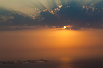 Stunning sunset clouds above the ocean