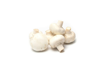 Fresh raw champignon mushrooms on white background