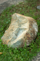 Stone Rock on grass
