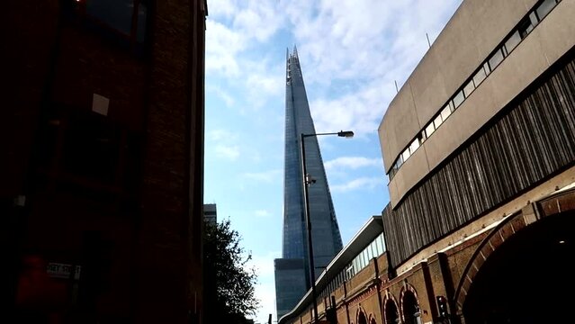 Contrast between old brick constructions and The Shard, modern and tallest building in the UK