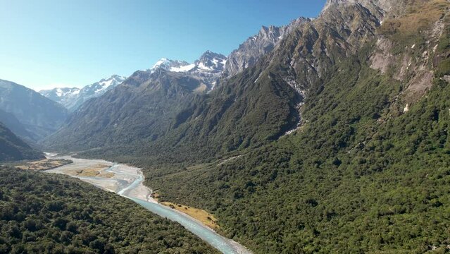 Copland river, valley and mountain vista. Beautiful natural scenery of New Zealand - aerial