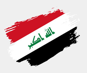 Artistic grunge brush flag of Iraq isolated on white background. Elegant texture of national country flag